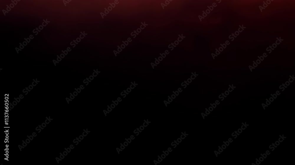 Aufkleber Vibrant red fabric flows gracefully in soft light creating a rich, dynamic visual experience