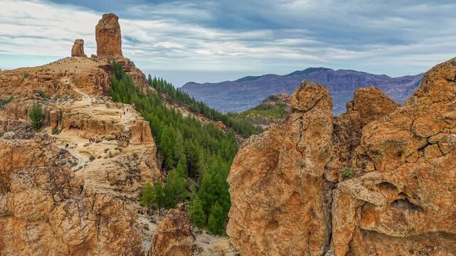 Aerial view of Roque Nublo in Gran Canaria island, showcasing stunning rock formations and scenic landscapes