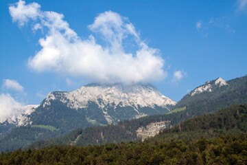 Mountains with clouds in southern Bavaria. Blue sky