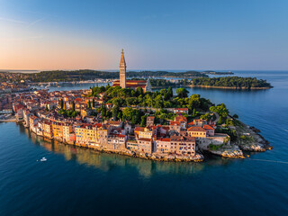 Rovinj, Croatia - Aerial view of the old town of Rovinj with Church of St. Euphemia at sunrise on a...