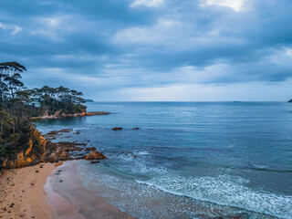 Fototapeta premium Cloudy Sunrise Seascape at Denhams Beach