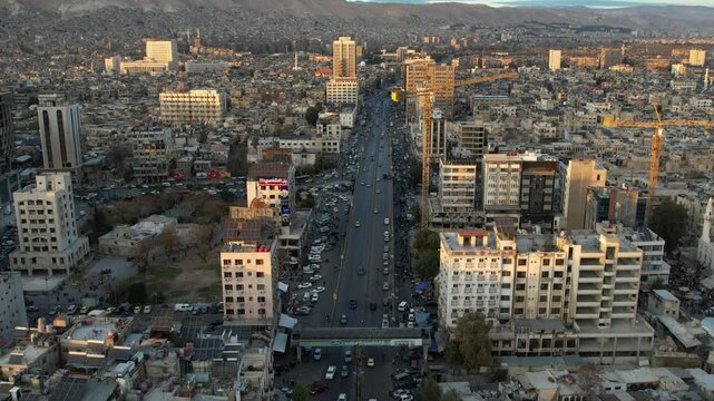 Aerial view of Damascus. Syrians celebrating the fall of Bashar al-Assad's regime. 