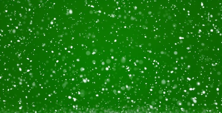 Snowfall overlay on a green screen background. Winter softly snow effect. Snowflakes effect loop animation isolated on chroma key backdrop. Winter snow falling Christmas, new year motion graphics.