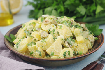 A bowl with Greek potato salads	