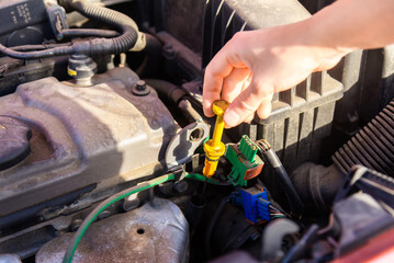 Checking oil level in engine after car accident for safety