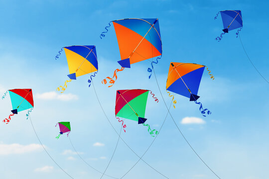 Flying kites with tails and bows. Playing for kids