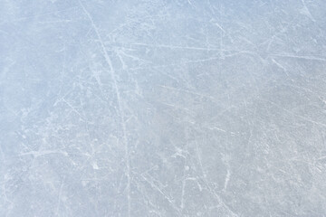 hockey puck and ice on the scratches surface abstract background ice arena