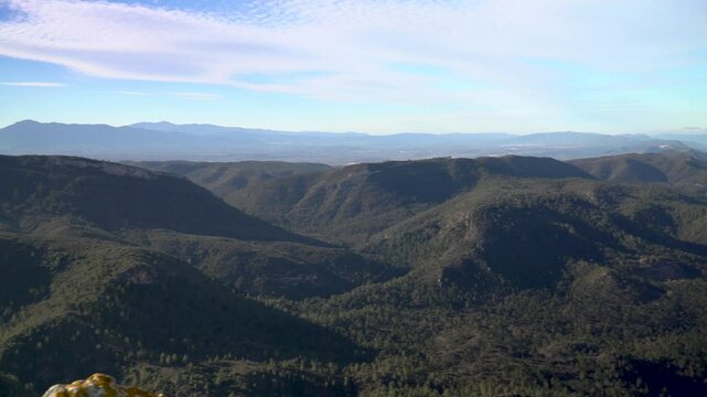 Drone view to a landscape with mountains on background.