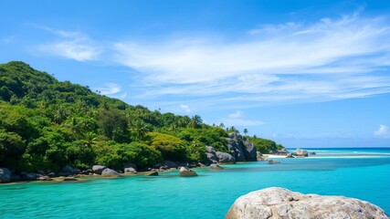 Obraz premium Tropical paradise with crystal clear turquoise waters, lush greenery, and granite rock formations on Praslin Island, Seychelles, Praslin Island, tropical paradise