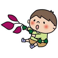 お芋掘りで後ろにひっくり返った子供（男の子）