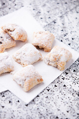 Stollen Bites on bright background. Soft focus. Close up. Copy space.	