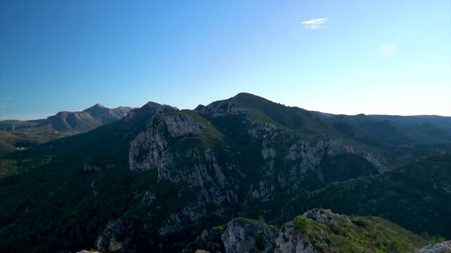 Drone view to a landscape with mountains on background.