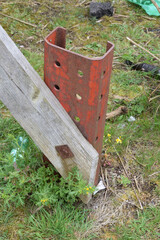 Rusted Metal Post with Timber Beam 