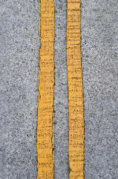 Yellow No Parking Markings on Concrete Road Surface 