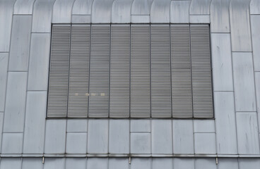 Slatted Ventilation Grill on Modern Metal Clad Building 