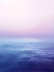 Obraz premium A gradient blending soft periwinkle blue to pale lavender, creating a serene and dreamy atmosphere. 