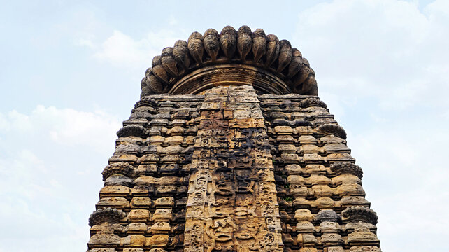 Intricate carvings on the shikhara (spire) and amalaka (disc) of the Old Jain Temple, Banda, Purulia, West Bengal, India.