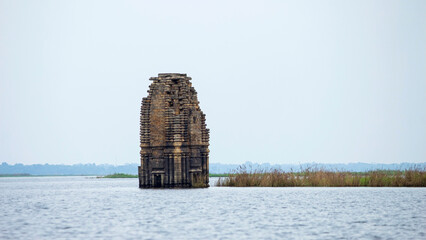 View of an ancient partially submerged ruin identified as a Jain Temple, Telkupi, Purulia, West...