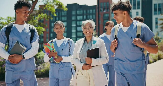 Walking, laughing or teacher in medical school with students, hospital internship or medicine study. Professor, lecturer or happy people with smile or learning advice for nursing degree in university