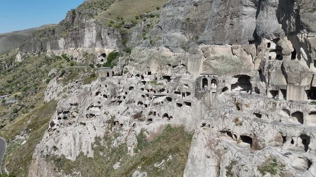Aerial view of Vardzia - ancient city complex and cave monastery, carved into Erusheti rocky mountain in Georgia. UNESCO World Heritage tentative list.