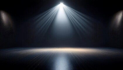 Spotlight illuminating an empty stage.