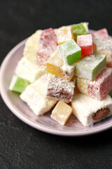 Delicious assortment of colorful Turkish delight served on a plate