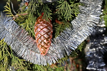Happy New Year.Christmas tree decorations and toys for fir trees covered with snow and ice. Close-up. Merry Christmas.2024.