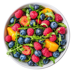 Obraz premium Fresh Mixed Berry and Fruit Salad with Greens in White Bowl