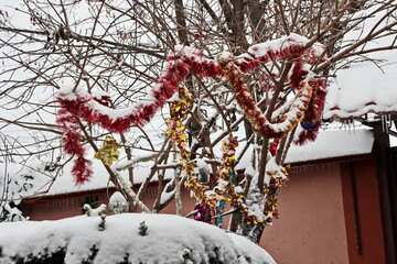 Happy New Year.Christmas tree decorations and toys for fir trees covered with snow and ice. Close-up. Merry Christmas.2024.