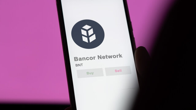 Close up on logo of (BNT) Bancor Network crypto asset on the screen of an exchange. (BNT) Bancor Network price stocks, $BNT on a device.