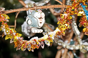 Happy New Year.Christmas tree decorations and toys for fir trees covered with snow and ice. Close-up. Merry Christmas.2024.