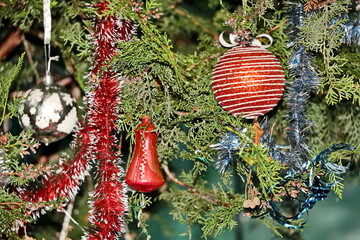 Happy New Year.Christmas tree decorations and toys for fir trees covered with snow and ice. Close-up. Merry Christmas.2024.