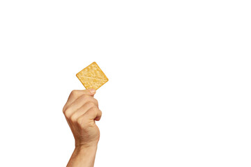 Man hand holding a cracker cookie on a white background