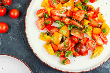 Delicious vegetable salad with fresh tomatoes.
