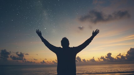 Fototapeta premium Silhouette of a man gazing at the Milky Way under starry skies. A serene nocturnal scene capturing cosmic wonder, infinite space, and a peaceful connection with the universe