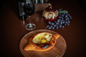 Khachapuri, a Georgian dish on the restaurant's set table