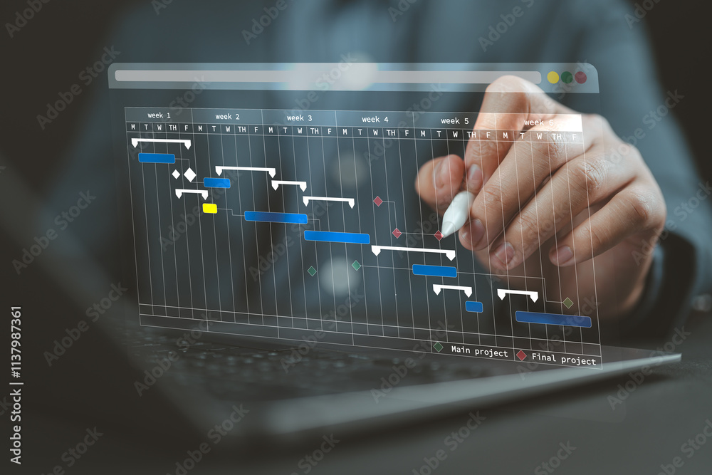 Leinwandbilder Project management or site engineer makes proceeding report concept. Plant manager use planning software to generate Gantt chart schedules for updating construction progress and operations plan tasks.