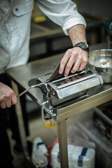 Cooking black khinkali in the restaurant kitchen