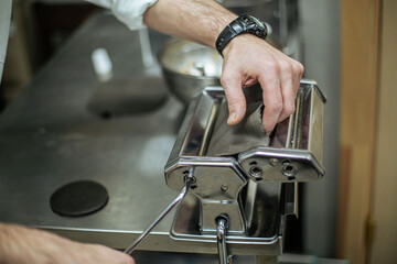 Cooking black khinkali in the restaurant kitchen