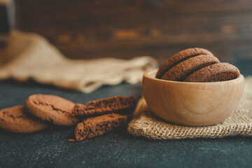 Chocolate brownie cookies in a wooden plate, sweets