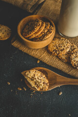 Homemade cookies with siftings and flax and a bottle of milk, good morning