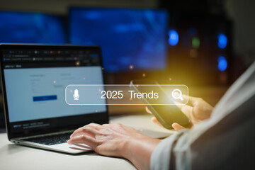 Search engine bar with 2025 trends wording for marketing monitor and business planing in new year concept. Finding information and new ideas for doing business in 2025.