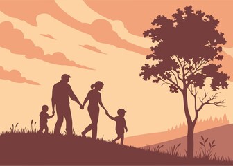 Silhouette of a family walking together on a grassy hill against a vibrant orange and red sunset sky
