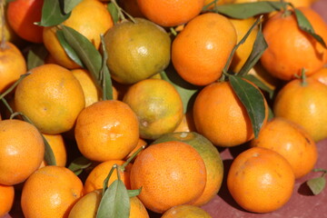 Fresh Tangerines with green leaves