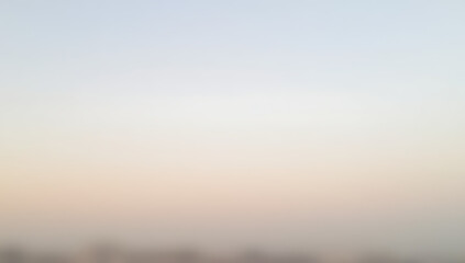 Fototapeta premium The sky appears as a soft, pale hue reminiscent of pastel colors when viewed from a distant location._00002_