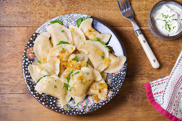 Dumplings with minced meat filling. Varenyky, vareniki, pierogi, pyrohy - dumplings with filling. High angle view