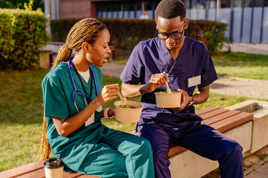 Medical professional in uniforms enjoying time together.