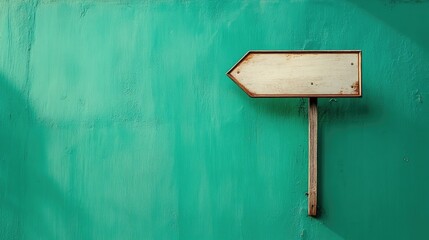 Directional wooden sign against a vibrant green background ideal for designed advertisements or guiding layouts