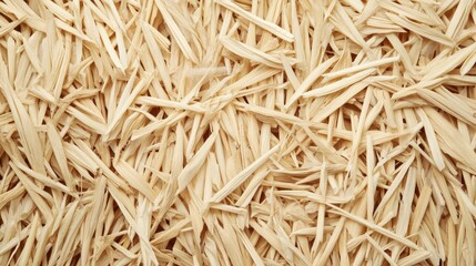 Dried rice stalks background texture ideal for natural, agricultural or rustic design elements