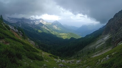 Fototapeta premium Stunning post-storm aerial view of the Dolomites showcasing dramatic clouds and vibrant green valleys beneath a moody sky.